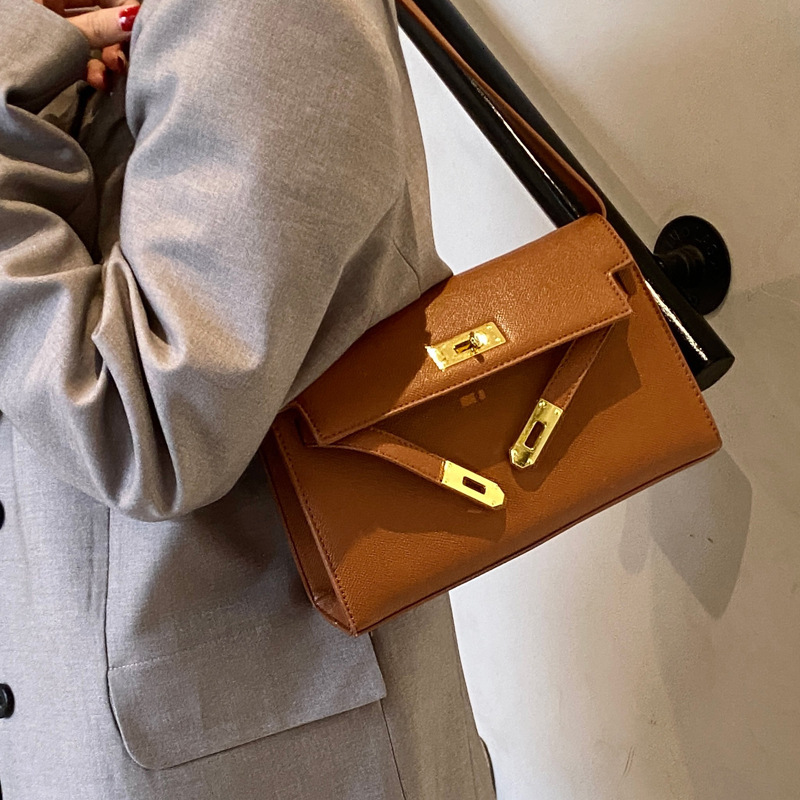 2025S Designer Women S Bag Light Luxury Texture Handbag Women S New Kelly Simple And Versatile Commuting Small Square Bag Single Shoulder Armpit Bag