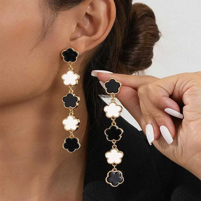 Simple floral earrings black and white lucky five-tassel stud earrings for womenXJ251113