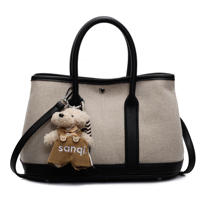 2025S Designer Women S Bag New Fashionable Handheld Bucket For Women In Spring Forest Cute Versatile Canvas Mother And Child Bag Popular Crossbody Bag