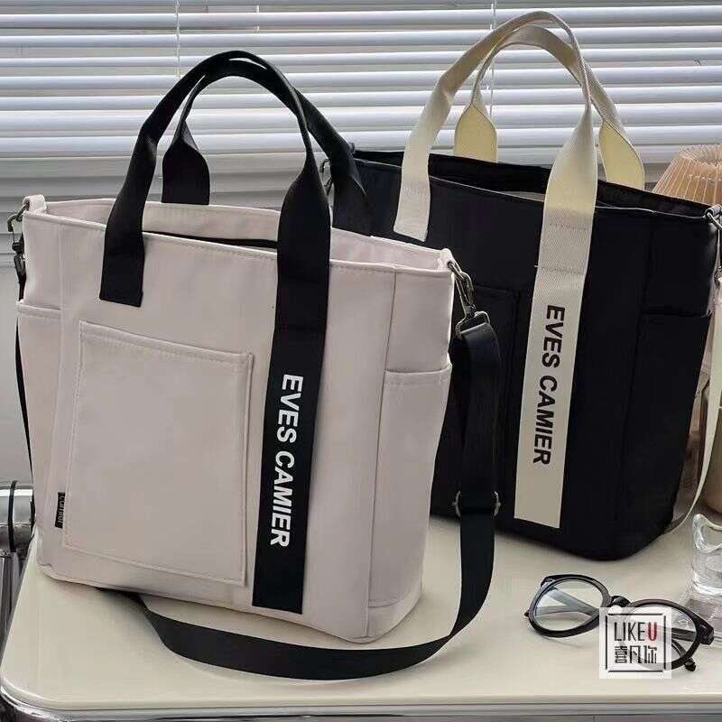 designer bag New design waterproof stylish tote canvas crossbody bag, simple and versatile, single shoulder hand-held bento lunch box bag