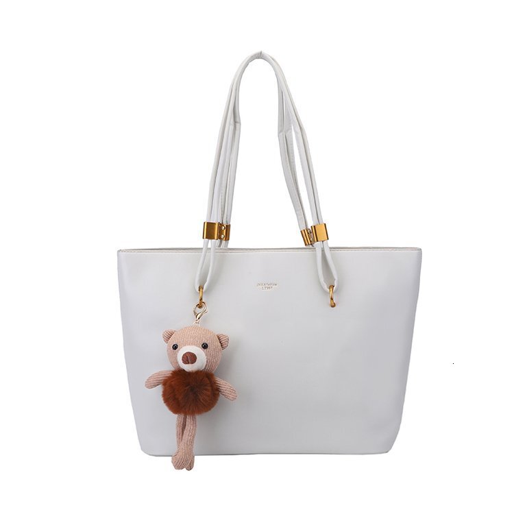 2025S Designer Women S Bag Large Capacity Minimalist Tote For Women S Outdoor Commuting Versatile Shoulder Bag PU Texture Solid Color Casual Handbag