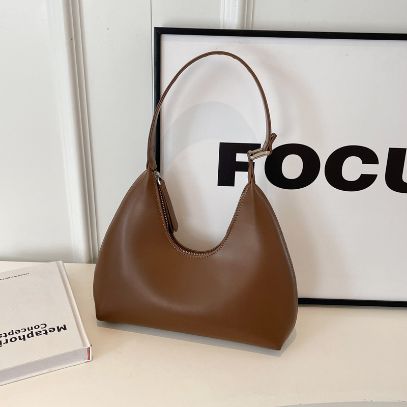 2025S Designer Women S Bag Underarm Women S New Simple Crescent Temperament Versatile Casual Travel Hand Held Texture Shoulder Bag