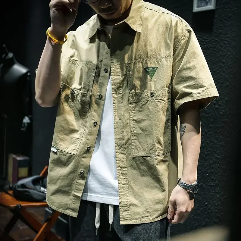 Mens short sleeved product with pocket shirt suitable for mens summer s Korean style fashionable Asian cotton top 250411
