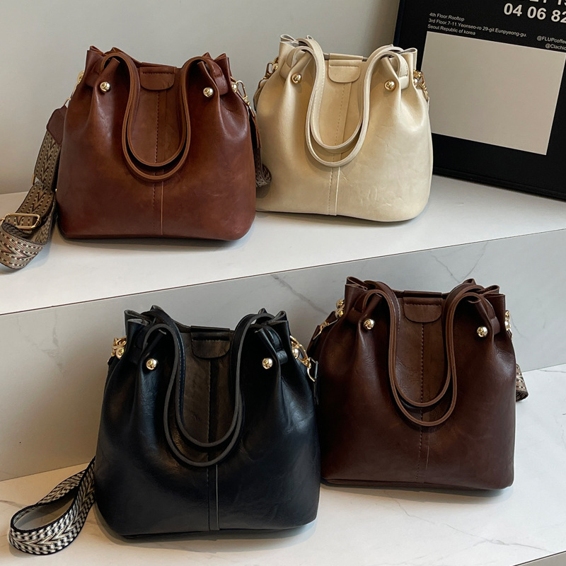 2025S Designer Women S Bag Fashionable And Simple Large Capacity Handbag For Women New Texture Bucket Bag Wide Strap Single Shoulder Crossbody Bag