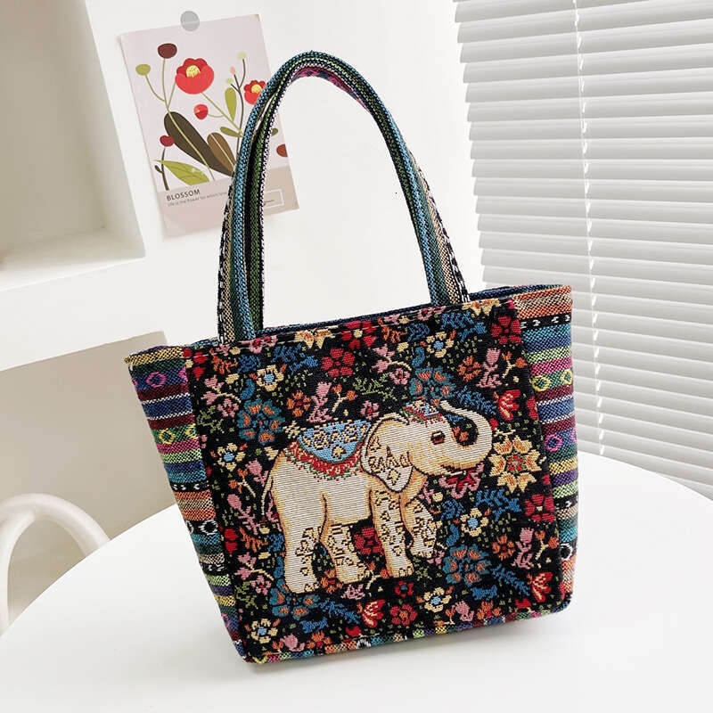 Cartoon embroidery canvas women's ethnic style casual mommy handbag, office worker small shoulder bag