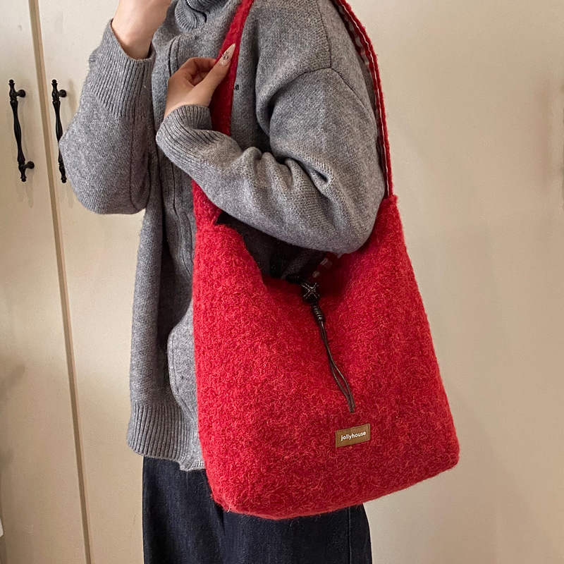 2025S Designer Women S Bag Winter Plush Bucket With Large Capacity Casual And Lazy Style Tote Fashionable Women S Bag Work Commuting Shoulder Bag