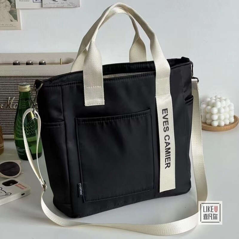 designer bag New design waterproof stylish tote canvas crossbody bag, simple and versatile, single shoulder hand-held bento lunch box bag