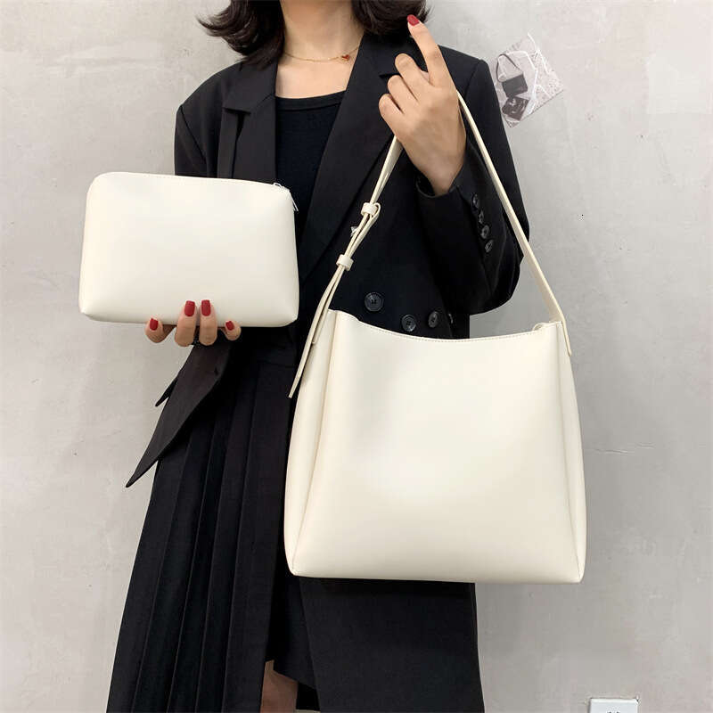 Single shoulder diagonal cross casual baozi mother tote large capacity simple water bucket women's bag