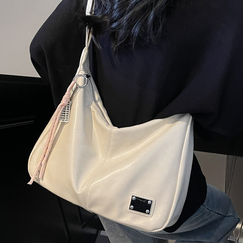 2025S Designer Women S Bag High End Handbag Women S Soft Leather Large Capacity Armpit New Commuting Shoulder Hand Held Tote Bag