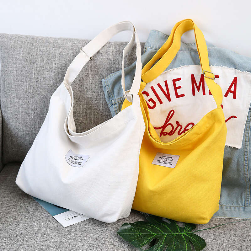 2025New Women's Big Korean Style Letter One Shoulder School Handheld Large Capacity Canvas Bag