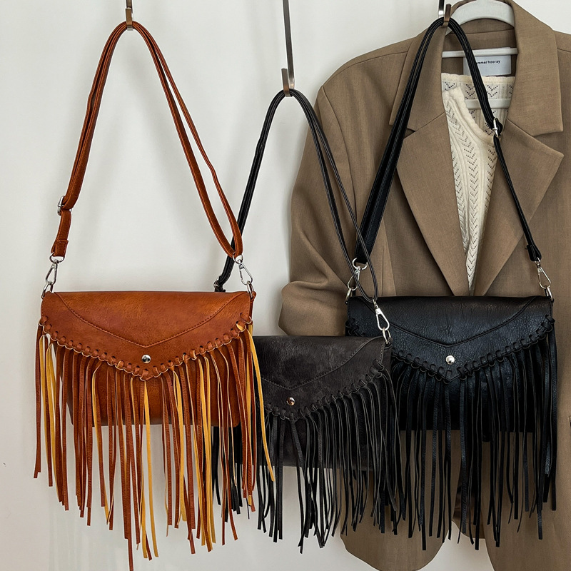 2025S Designer Women S Bag Small Niche Design For Women New Fashionable Tassel Mailman Summer Versatile Wax Leather Crossbody Women S Bag