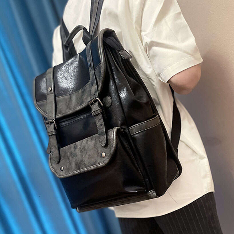 Backpack P166 Japanese and Korean Men's New Soft Leather Large Capacity Fashion Leisure Travel Backpack