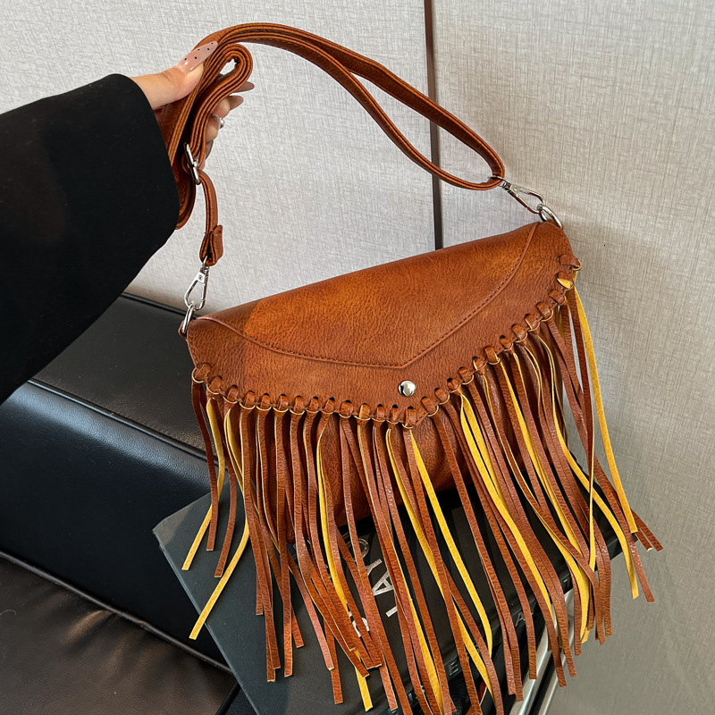 2025S Designer Women S Bag Small Niche Design For Women New Fashionable Tassel Mailman Summer Versatile Wax Leather Crossbody Women S Bag