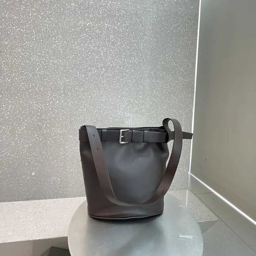 Leather belt buckle bucket hand-held single shoulder armpit bagW251112