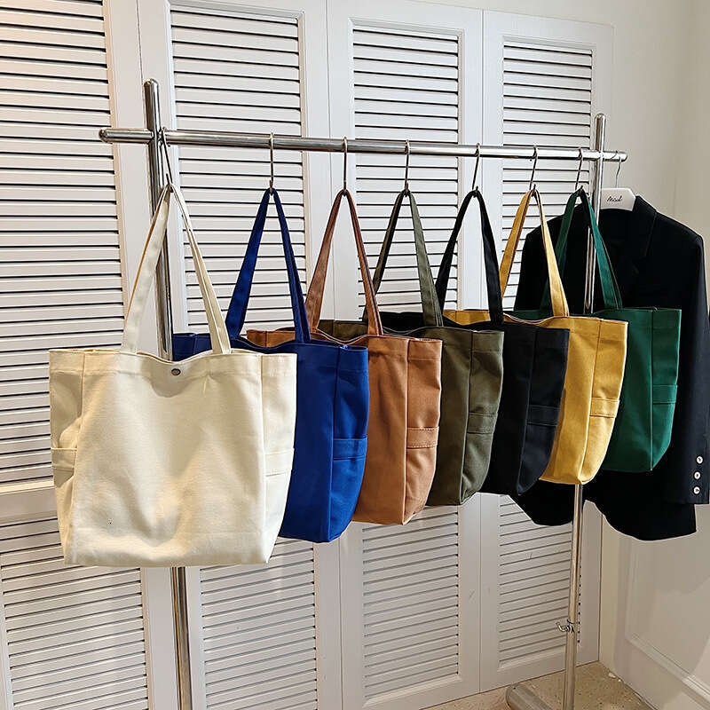 Canvas Korean version artistic solid color large capacity single shoulder tote for versatile work ins women's commuting bag