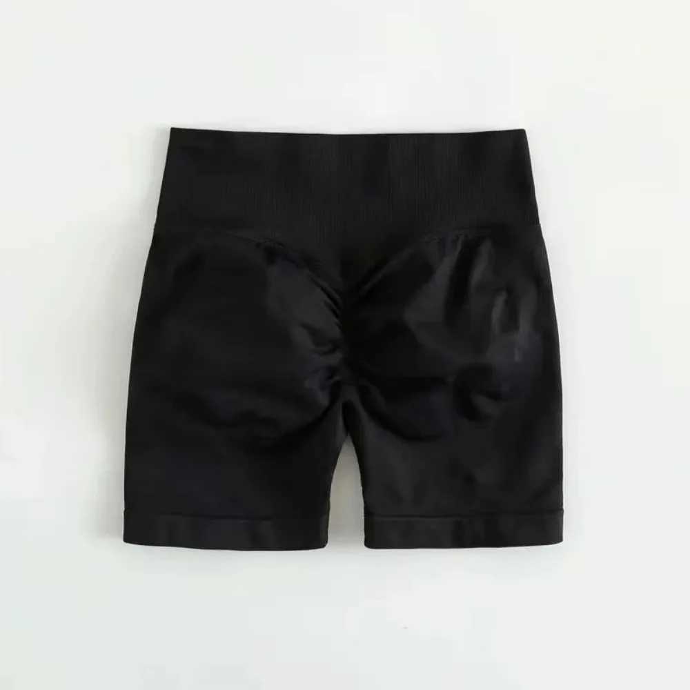 Womens seamless fabric sports shorts push-pull tight shorts womens high waisted hip rib gym training shorts Y250412