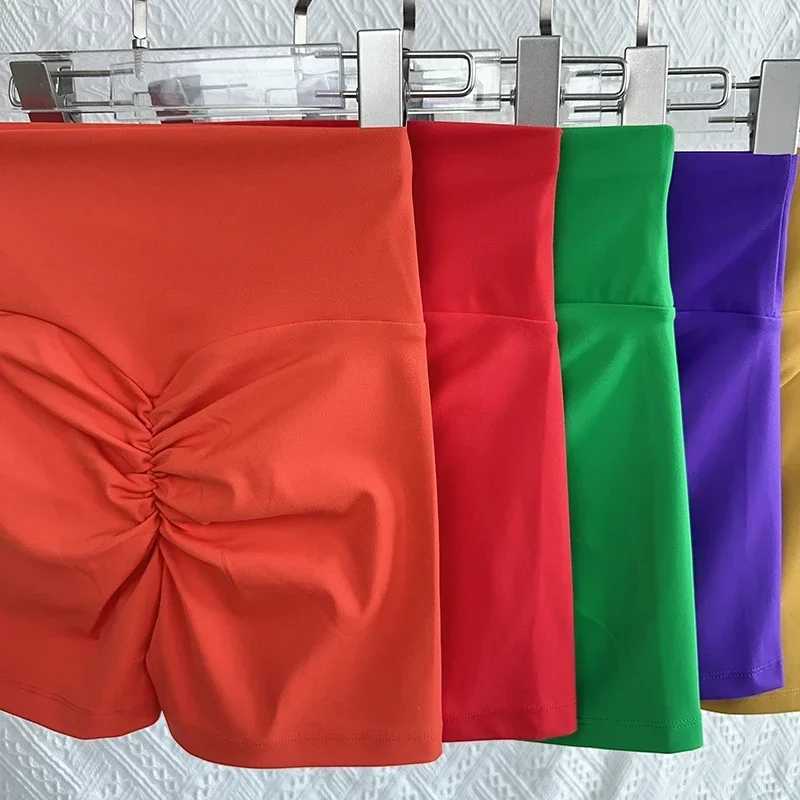 Solid color high waist seamless hip lifting yoga shorts breathable and fast drying fitness legs cycling and running sports shorts Y250412
