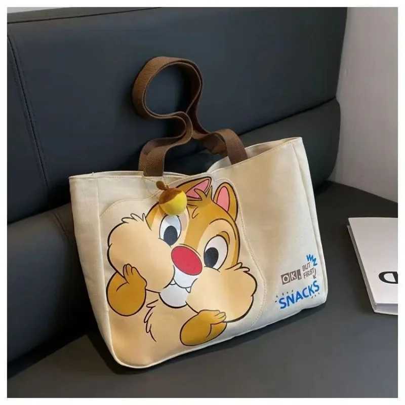 Disney New Disney Chichititi Cartoon Printed Large Capacity Womens Handbag Daily Travel Mummy Bag Fashion Shoulder BagXJ250412