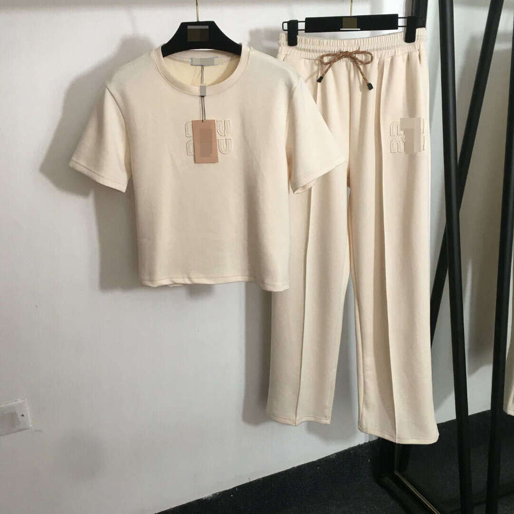 Designer clothing 25 New Nanyou Sports Set Fashion Embroidered Letter Patch Short Sleeve T-shirt+Elastic Waist Casual Straight Pants
