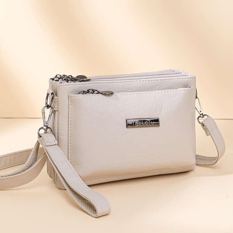 Niche texture shoulder for women 2025 new fashionable multi compartment women's coin purse soft leather handbag carrying crossbody bag