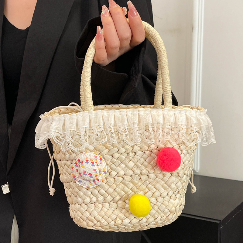 2025S Designer Women S Bag Summer New Straw Woven For Women With High Beauty Kitty Lightweight Handheld Women S Bag Cute Pendant Bow Weaving