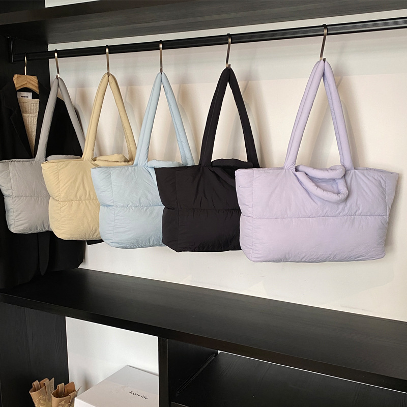 2025S Designer Women S Bag Women S New Cotton Down Jackets Niche South Korean Space Bags One Shoulder Tote Oversized Bags Popular This Year
