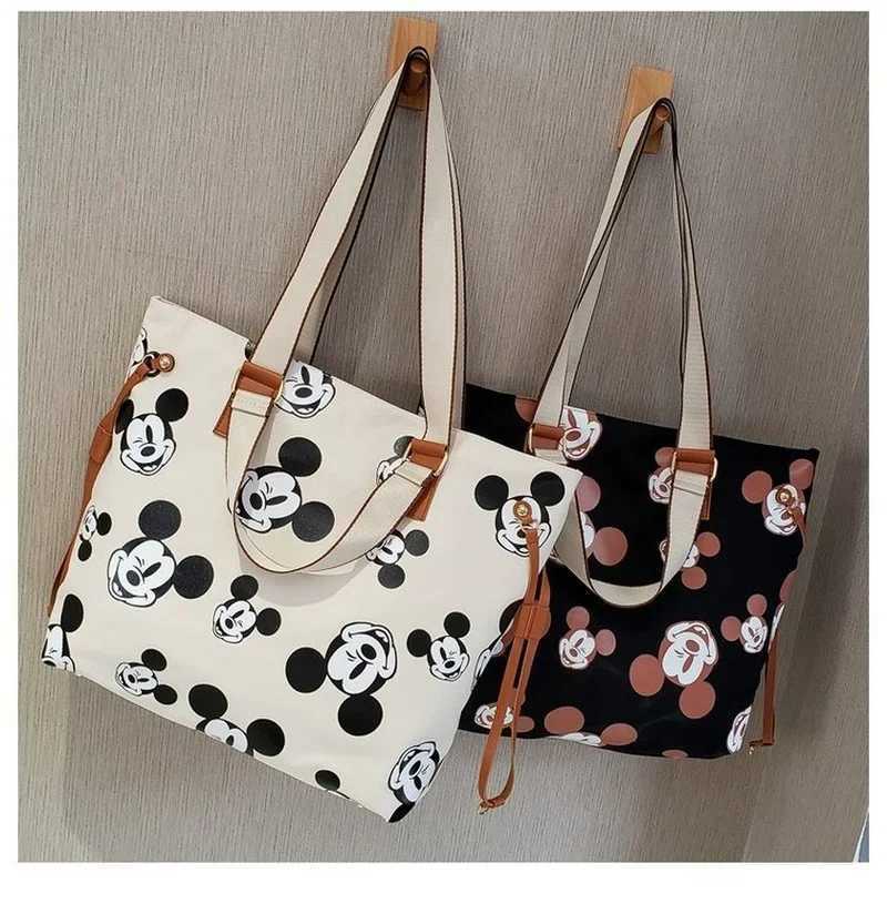 Disney joint brand Mickey Fashion Womens Shoulder Bag Large Capacity Multi Functional Storage Bag High Quality Womens HandbagXJ250412