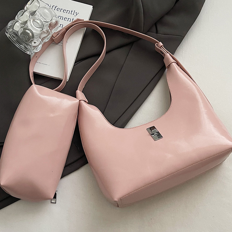 2025S Designer Women s Bag Niche high end handbag sweet cool spicy and high end new versatile one shoulder armpit bag casual crescent bag