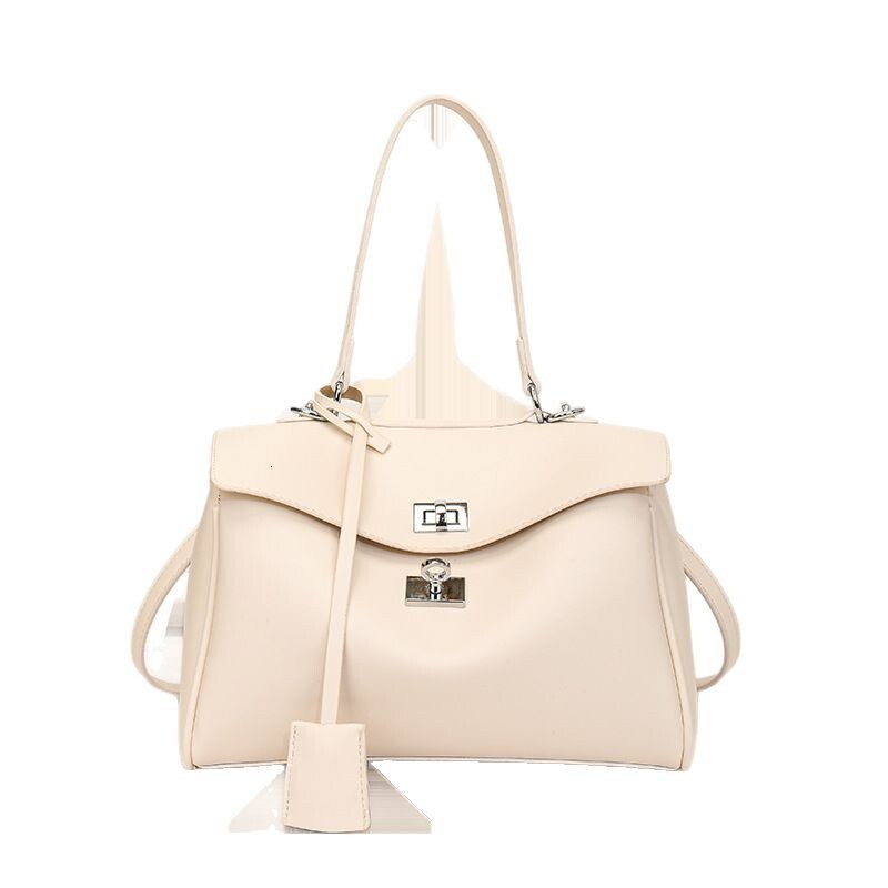 2025S Designer Women S Bag Advanced Texture Kelly Simple Shoulder New Tote Women S Large Capacity Commuter Fashion Underarm Bag