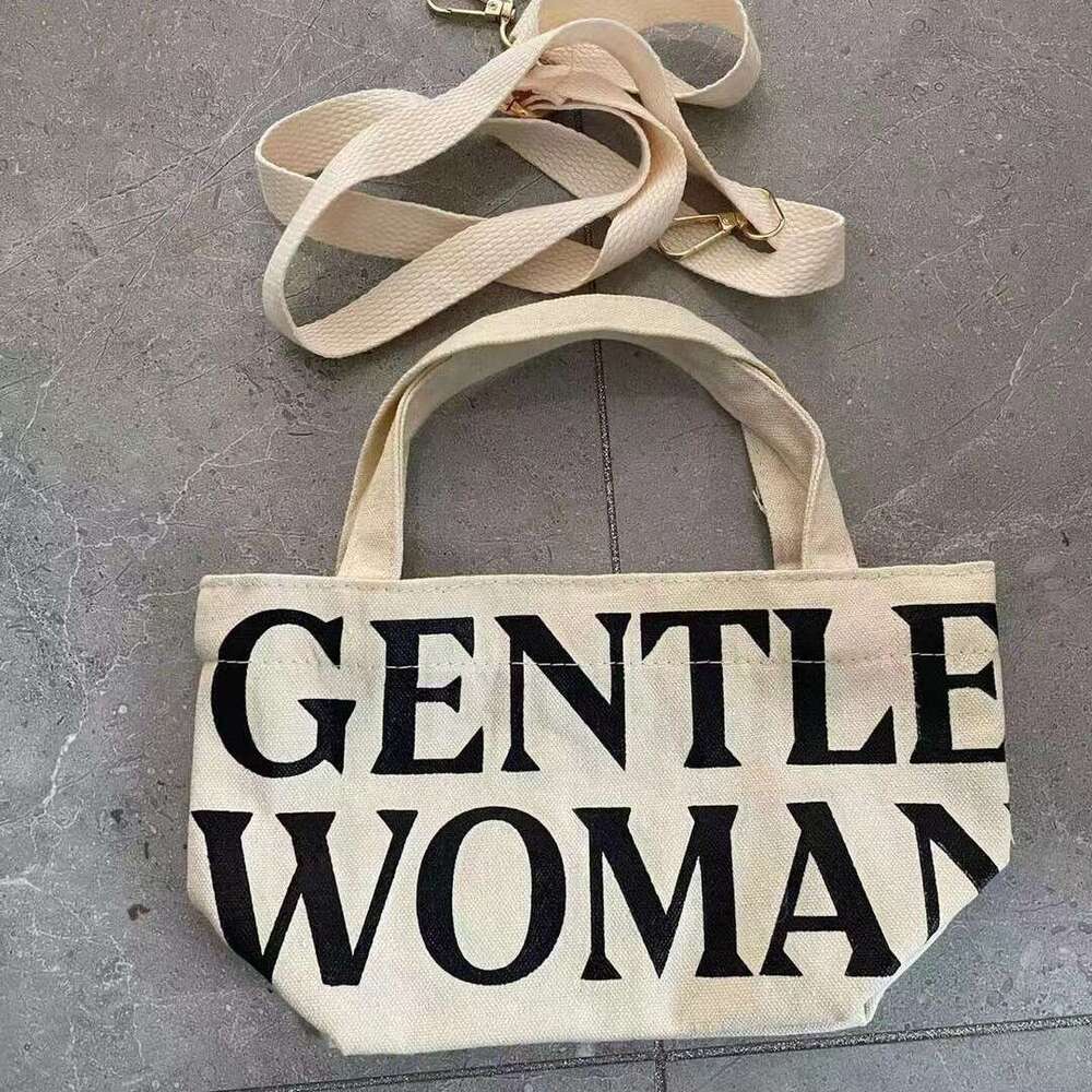 INS trendy crossbody artistic casual single shoulder hand-held dual-use letter canvas shopping bag