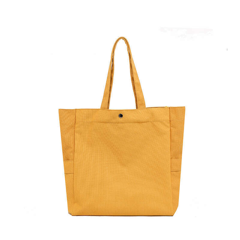 Canvas Korean version artistic solid color large capacity single shoulder tote for versatile work ins women's commuting bag