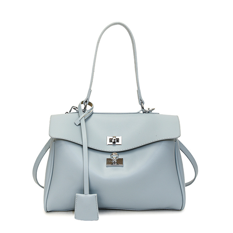 2025S Designer Women S Bag Advanced Texture Kelly Simple Shoulder New Tote Women S Large Capacity Commuter Fashion Underarm Bag