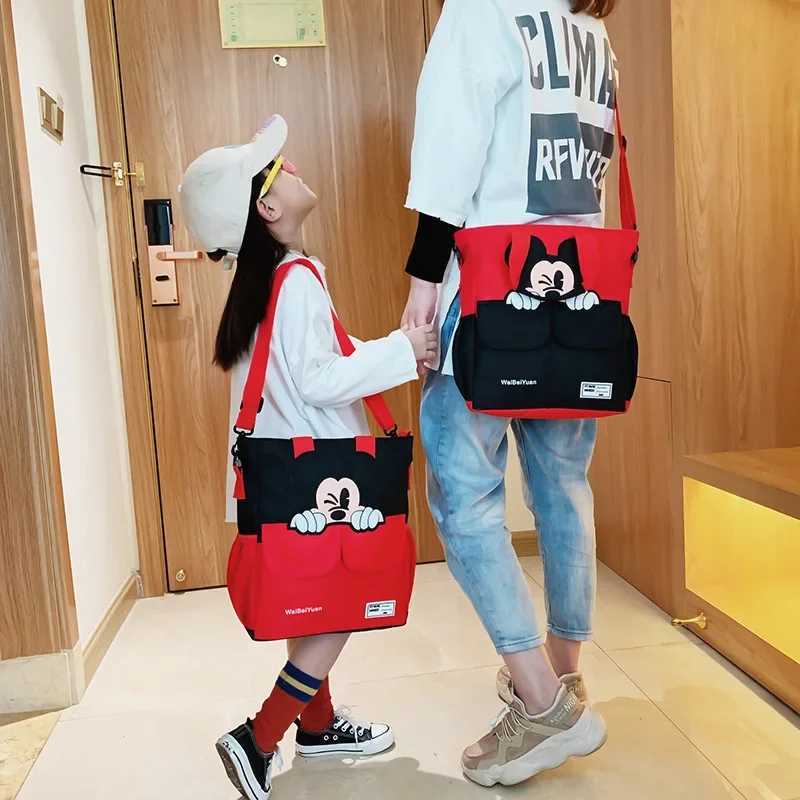 Disney 2025 New Disney Mickey Cartoon Printed Childrens Tutorial Bag Primary School Handbag Large Capacity Shoulder Messenger BagXJ250412