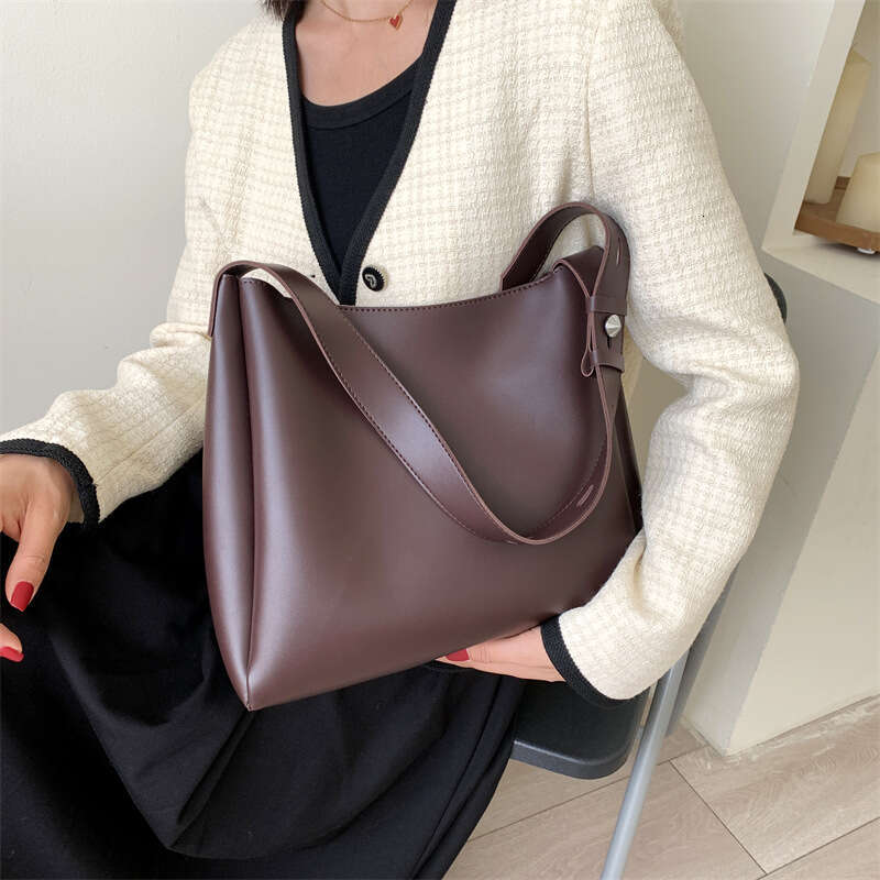 Single shoulder diagonal cross casual baozi mother tote large capacity simple water bucket women's bag