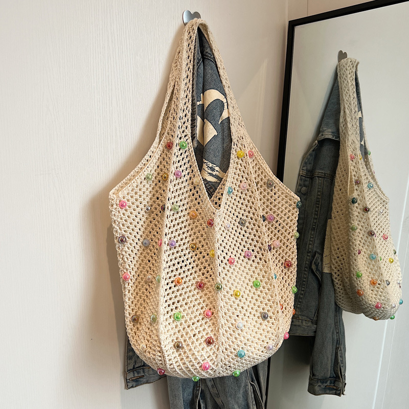 2025S Designer Women S Bag Knitted Handbag Handheld Women S Japanese Handwoven Hollow Casual One Shoulder Tank Top Large Capacity Crossbody Bag