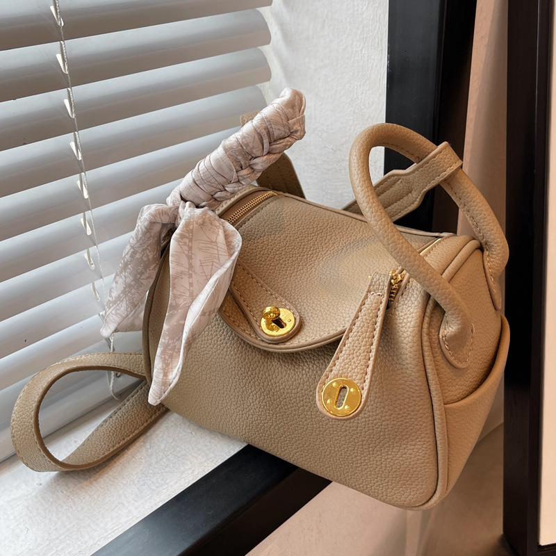 2025S Designer Women S Bag High End Crossbody Textured Hand Held Small Bag New Popular Versatile And Stylish Women S Shoulder Bag