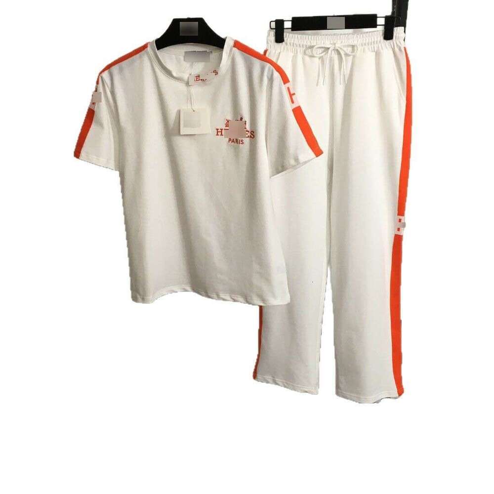 25 new summer Nanyou sports suit with embroidered carriage on the chest, short sleeved T-shirt and woven edge casual pants