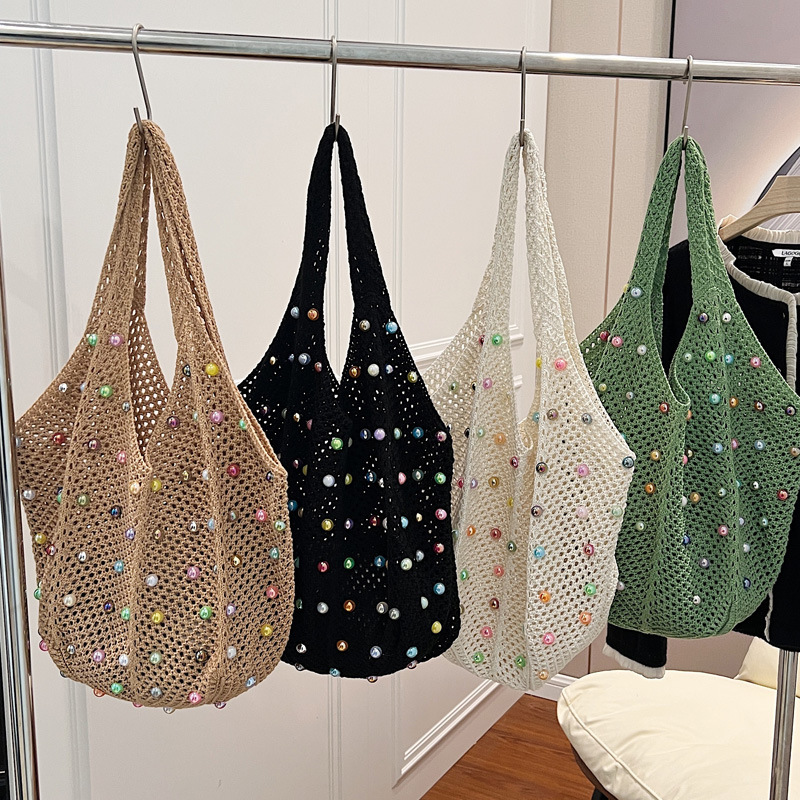 2025S Designer Women S Bag Knitted Handbag Handheld Women S Japanese Handwoven Hollow Casual One Shoulder Tank Top Large Capacity Crossbody Bag