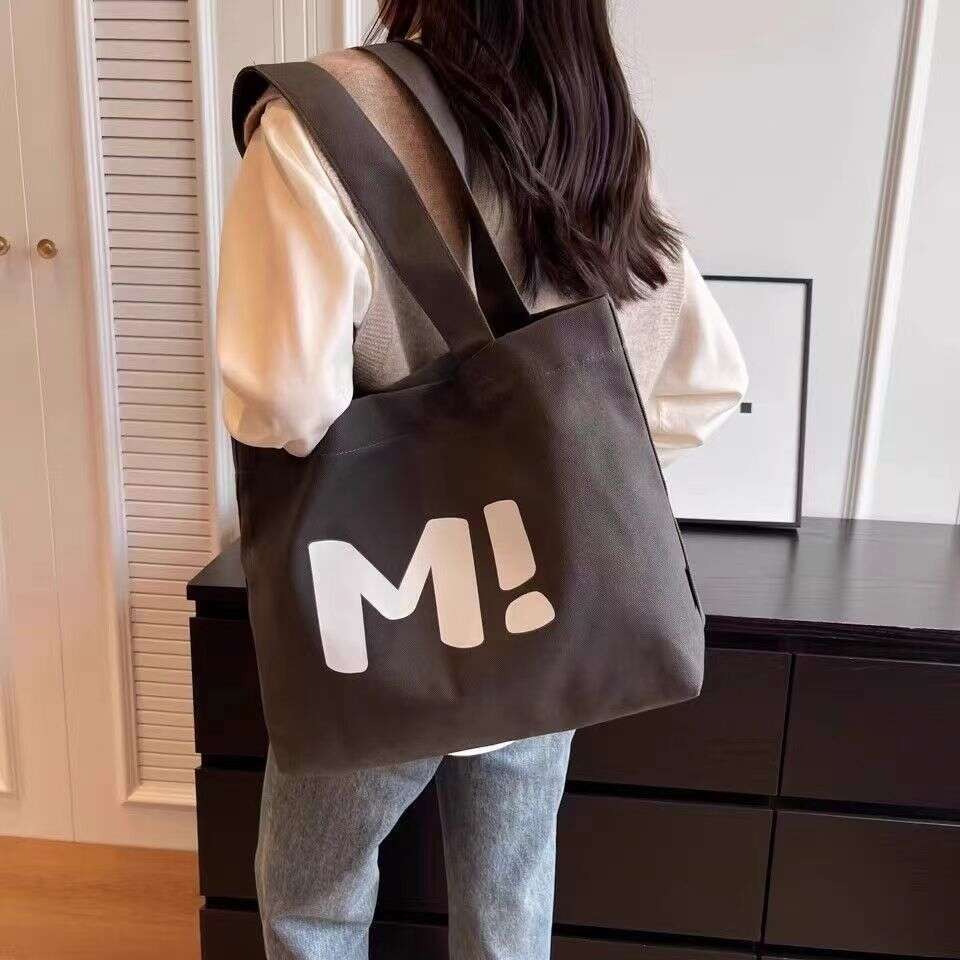 Canvas for women, large capacity, sturdy supermarket shopping bag, simple and versatile. 2024 new single shoulder tote bag