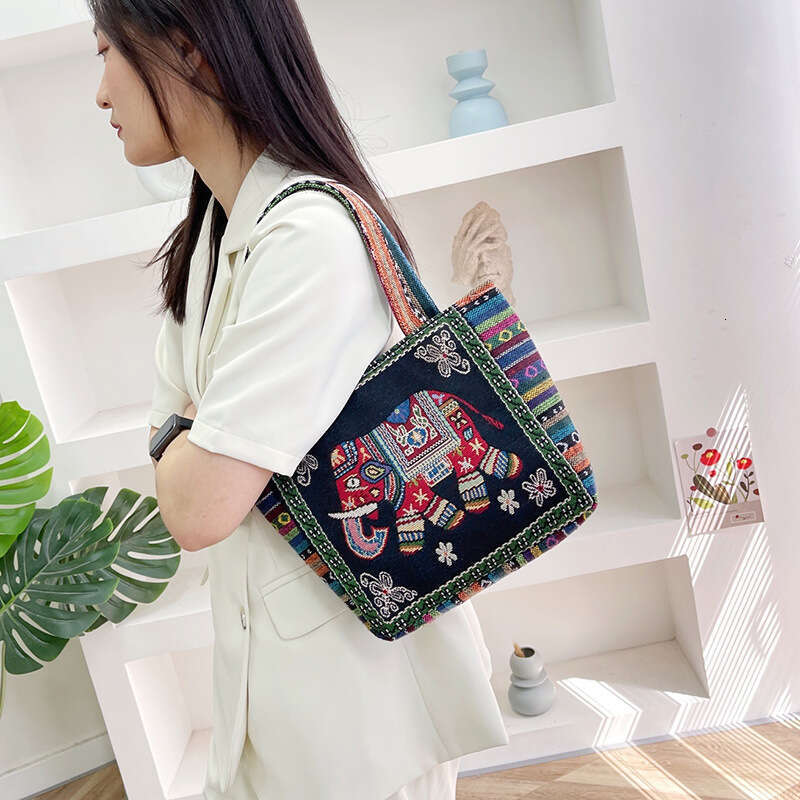 Cartoon embroidery canvas women's ethnic style casual mommy handbag, office worker small shoulder bag