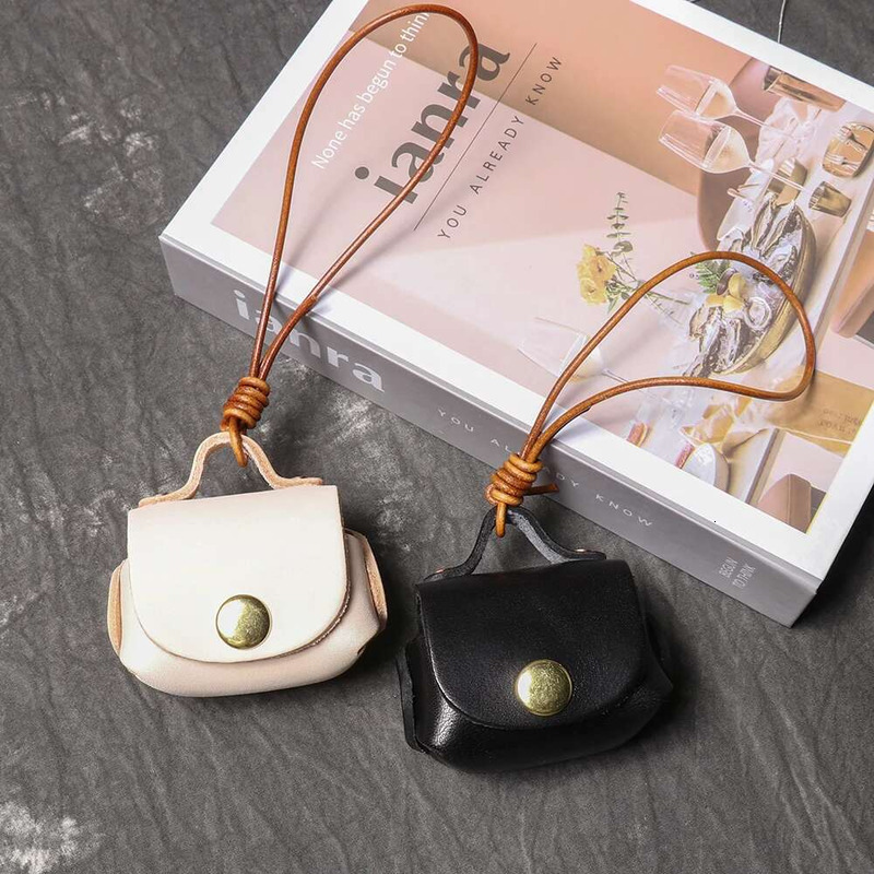LUOKIR Vintage Genuine Leather Headphone Case Pendant, Women's Small Coin Purse, Top Layer Cowhide Bag Accessory.