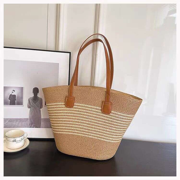 Women's ins new simple and fashionable grass woven large capacity armpit single shoulder hollow weave beach bag for women
