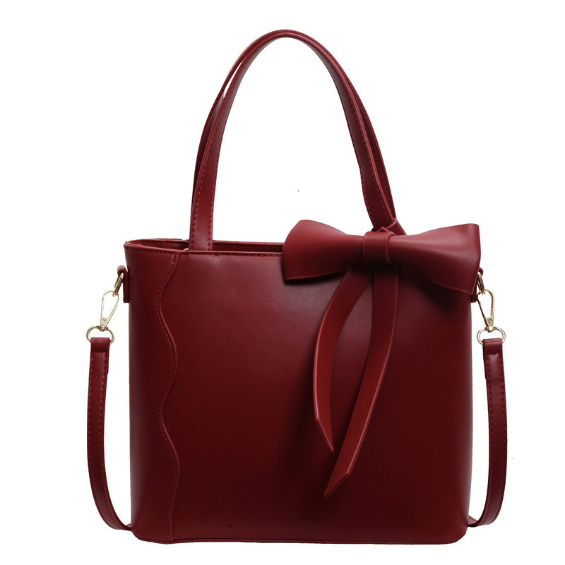 2025S Designer Women S Bag Handheld Commuter Summer Korean Edition Fashion Trend Shoulder High End Small And Simple Tote Women S Bag