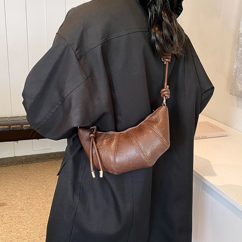 2025S Designer Women S Bag Personalized Minimalist Croissant For Women New Niche Design Shoulder Fashionable And Popular Crossbody Dumpling Bag