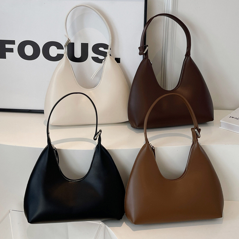 2025S Designer Women S Bag Underarm Women S New Simple Crescent Temperament Versatile Casual Travel Hand Held Texture Shoulder Bag