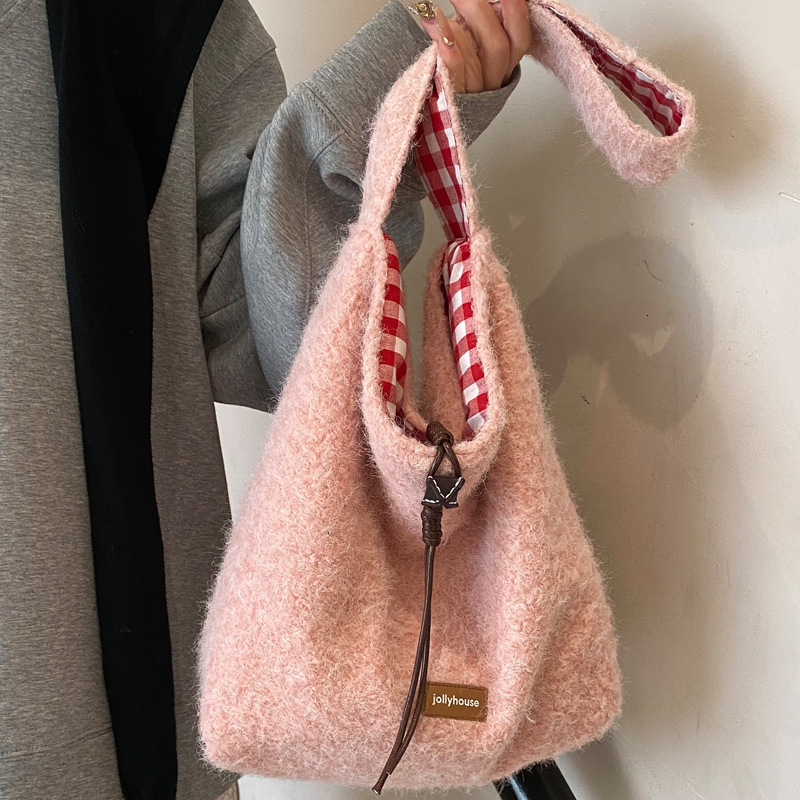 2025S Designer Women S Bag Winter Plush Bucket With Large Capacity Casual And Lazy Style Tote Fashionable Women S Bag Work Commuting Shoulder Bag