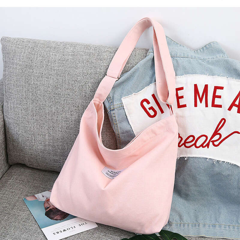 2025New Women's Big Korean Style Letter One Shoulder School Handheld Large Capacity Canvas Bag