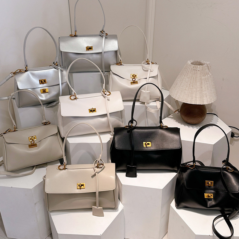 2025S Designer Women S Bag Handbag Large Capacity New Buckle Shoulder Trendy Commuting Crossbody Tote Women S Bag