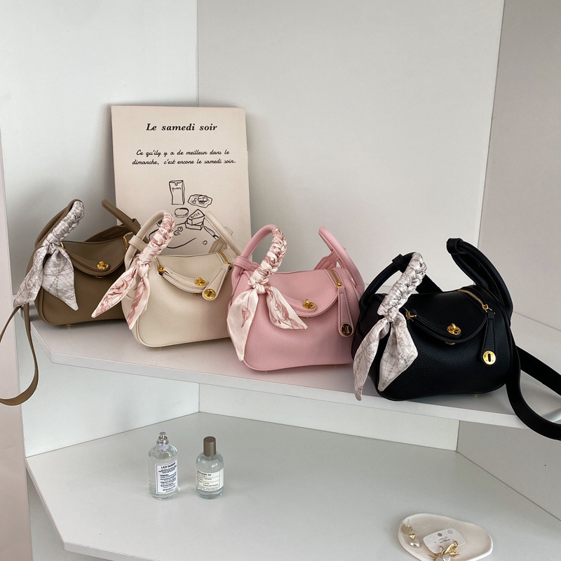 2025S Designer Women S Bag High End Crossbody Textured Hand Held Small Bag New Popular Versatile And Stylish Women S Shoulder Bag