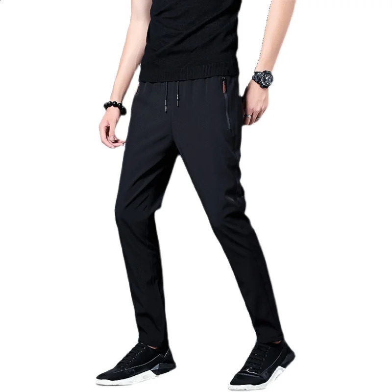 High quality summer mens ice silk quick drying casual pants slim fit Korean version ice silk pants sports pants straight Tu 250409